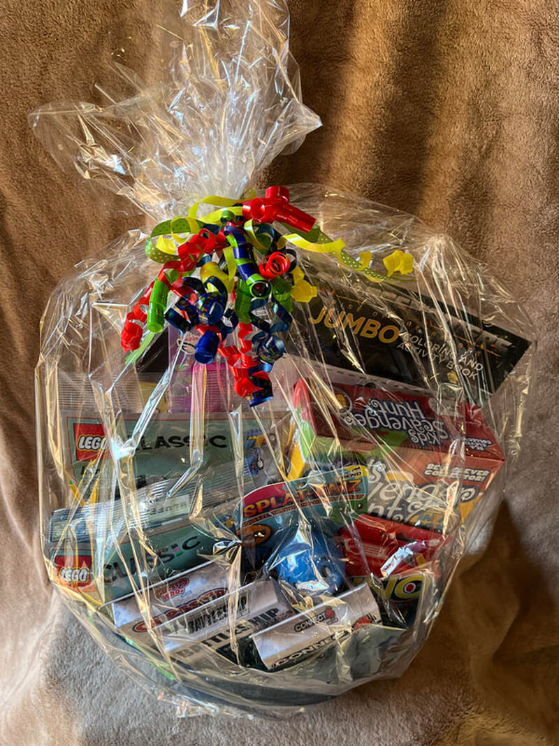 Raffle prize #7: Collection of card games, legos, and coloring book