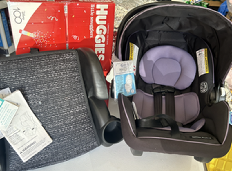 Prize #5 - Baby basket: Huggies diaper starter kit (size n & 1), infant car seat, car booster seat